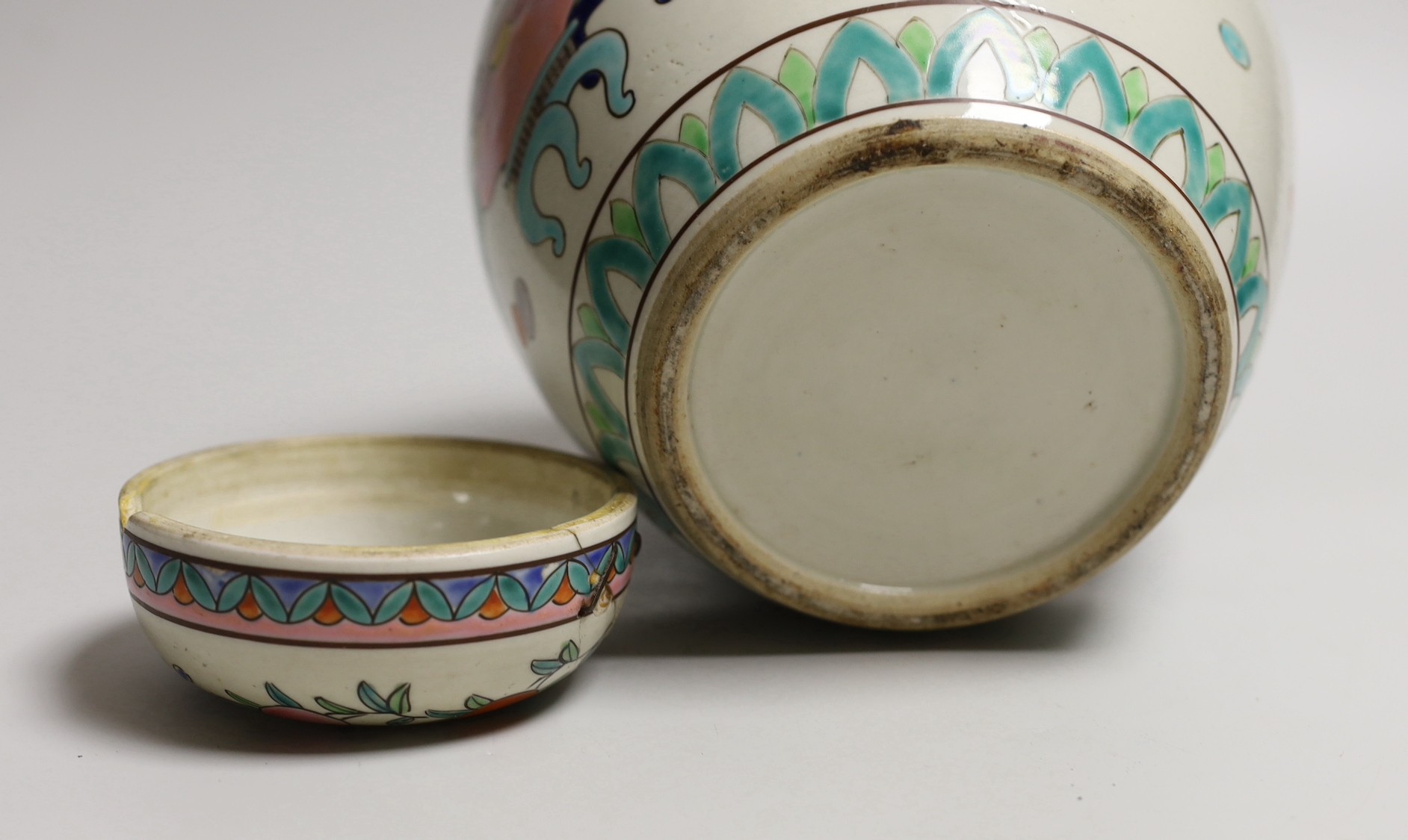 An early 20th century Japanese famille rose jar and cover, 23cms high